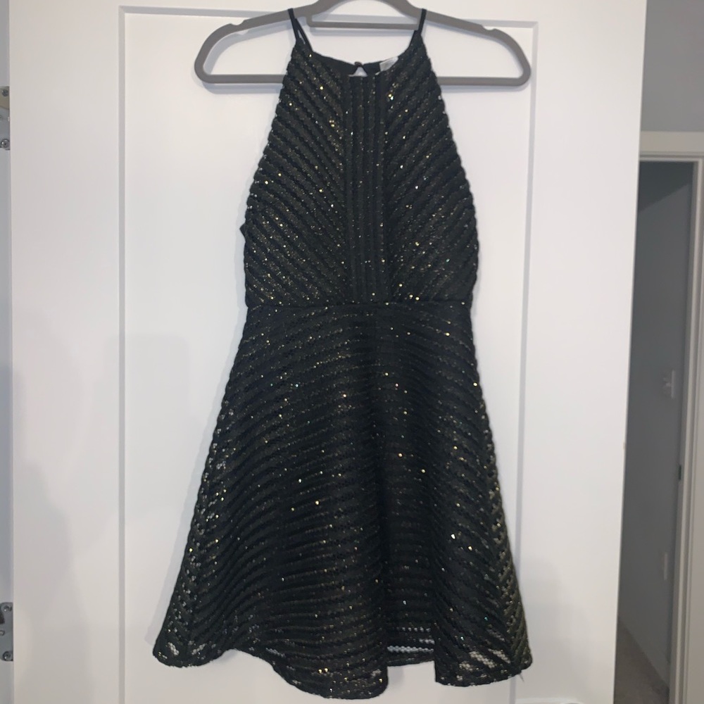 Sienna Sky Medium black dress with gold accents